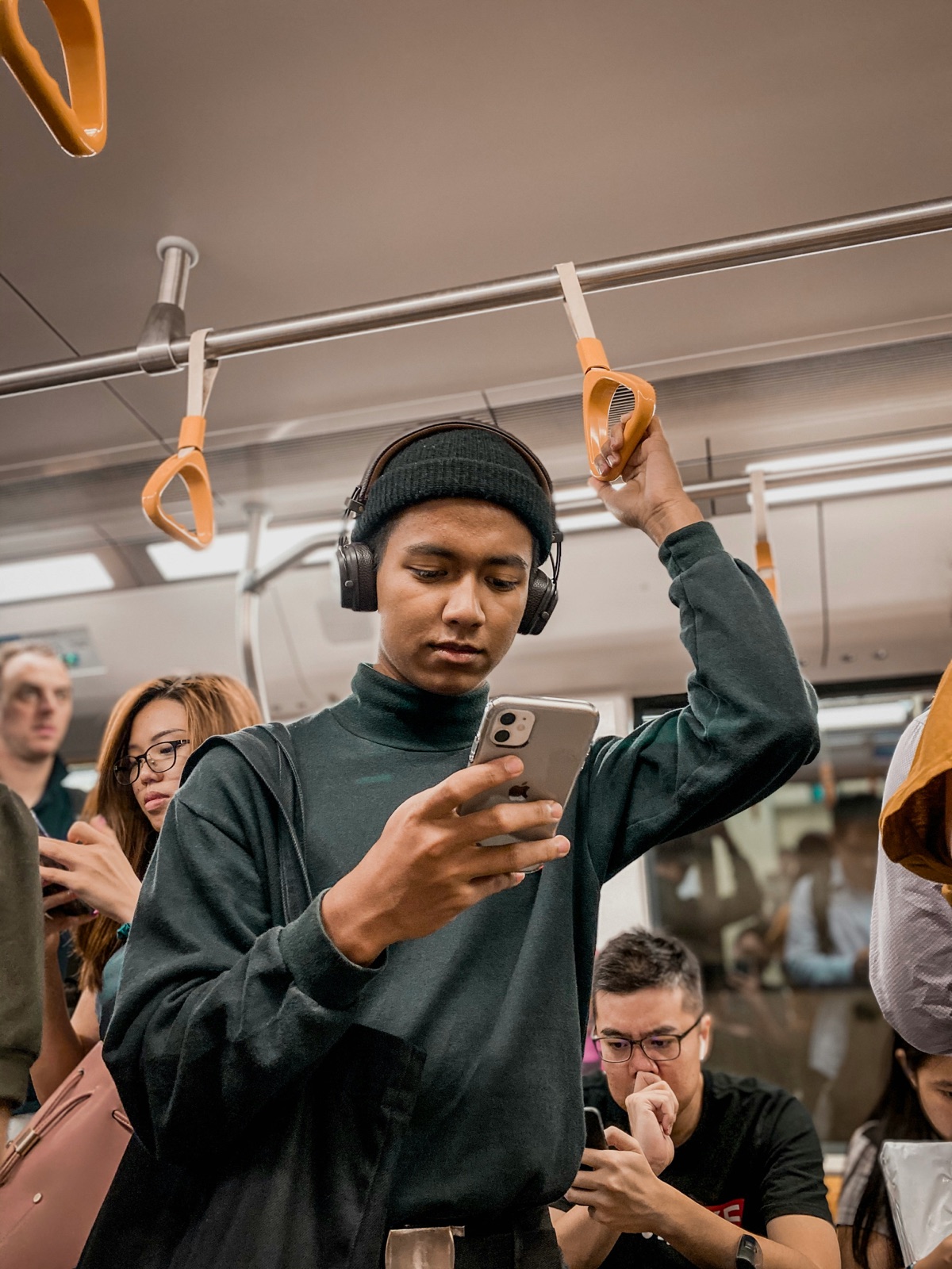 A shopper browsing a store on their phone in transit